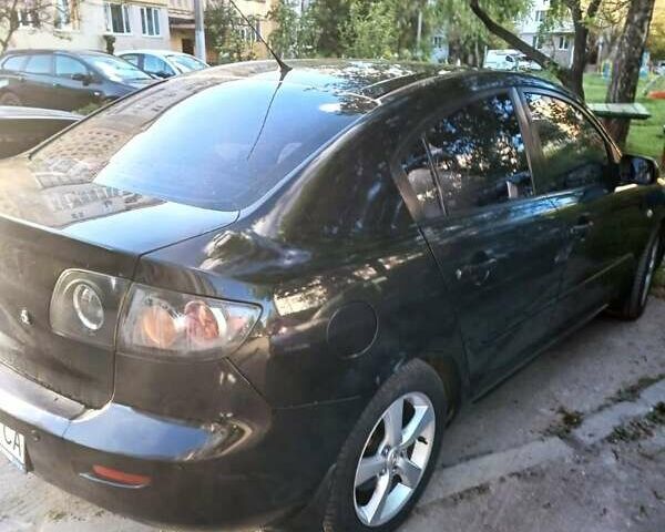 Чорний Мазда 3, об'ємом двигуна 2 л та пробігом 151 тис. км за 4800 $, фото 2 на Automoto.ua