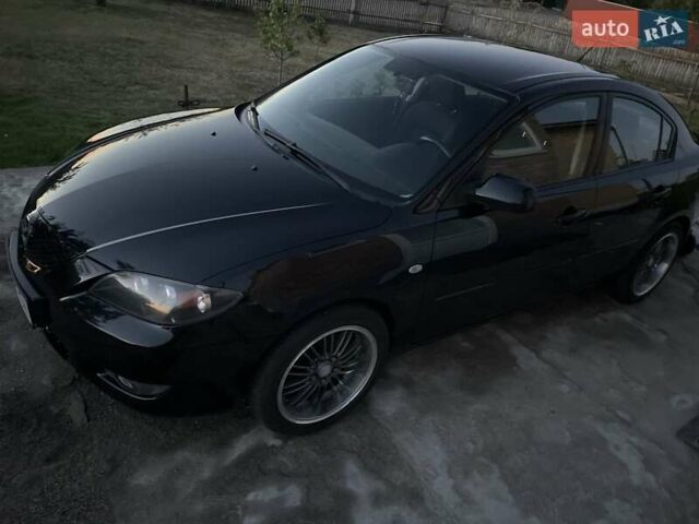 Черный Мазда 3, объемом двигателя 1.6 л и пробегом 173 тыс. км за 6300 $, фото 5 на Automoto.ua