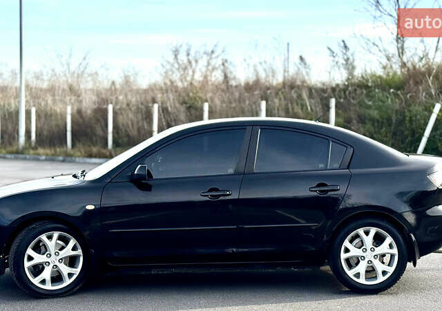 Чорний Мазда 3, об'ємом двигуна 1.6 л та пробігом 237 тис. км за 5850 $, фото 7 на Automoto.ua