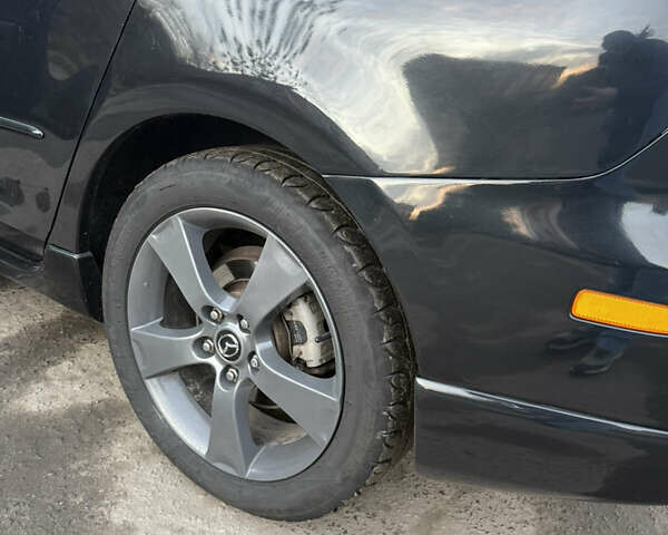 Черный Мазда 3, объемом двигателя 2 л и пробегом 260 тыс. км за 4950 $, фото 6 на Automoto.ua