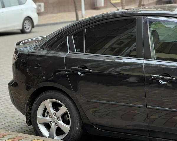 Черный Мазда 3, объемом двигателя 1.6 л и пробегом 192 тыс. км за 5500 $, фото 11 на Automoto.ua