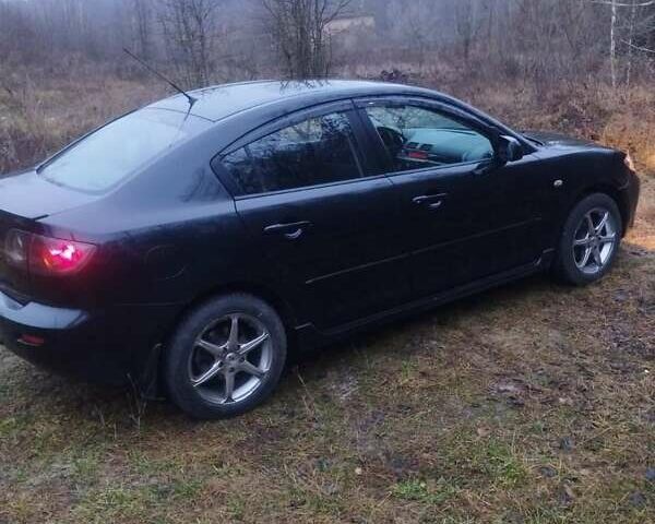 Черный Мазда 3, объемом двигателя 1.6 л и пробегом 243 тыс. км за 4499 $, фото 6 на Automoto.ua