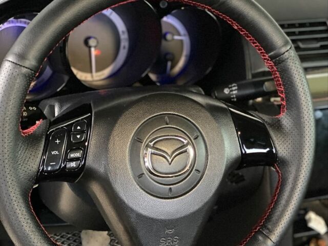 Чорний Мазда 3, об'ємом двигуна 1.6 л та пробігом 176 тис. км за 5800 $, фото 5 на Automoto.ua