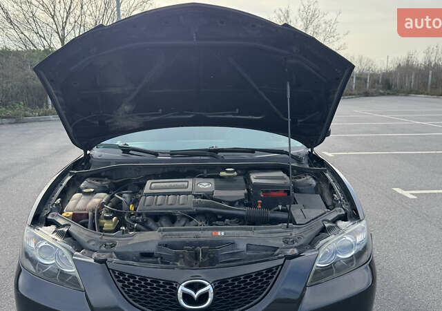 Чорний Мазда 3, об'ємом двигуна 1.6 л та пробігом 237 тис. км за 5850 $, фото 56 на Automoto.ua