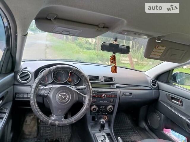Чорний Мазда 3, об'ємом двигуна 1.6 л та пробігом 356 тис. км за 2000 $, фото 7 на Automoto.ua