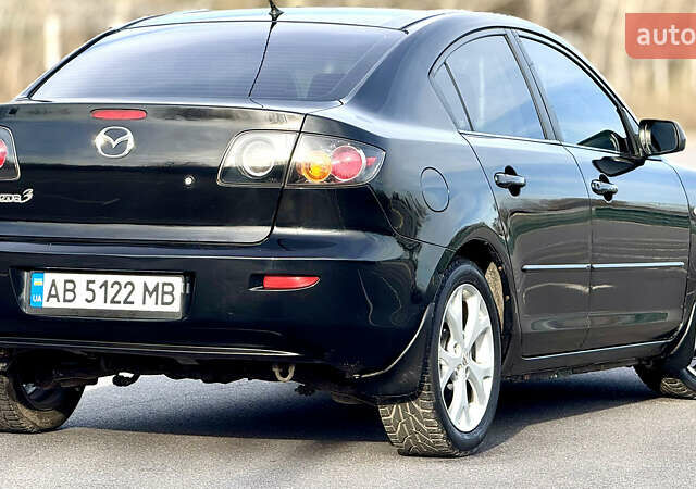 Чорний Мазда 3, об'ємом двигуна 1.6 л та пробігом 237 тис. км за 5850 $, фото 24 на Automoto.ua