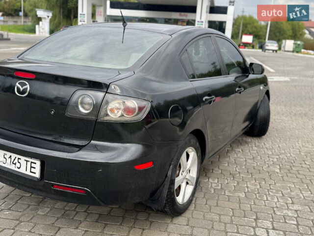Чорний Мазда 3, об'ємом двигуна 1.6 л та пробігом 231 тис. км за 3650 $, фото 6 на Automoto.ua