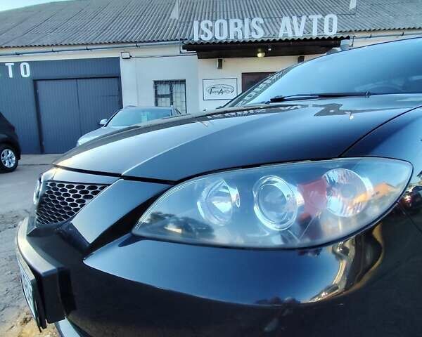 Чорний Мазда 3, об'ємом двигуна 1.6 л та пробігом 149 тис. км за 4800 $, фото 13 на Automoto.ua