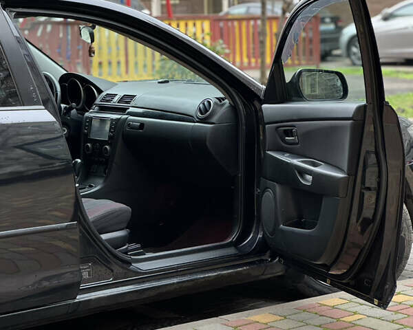 Черный Мазда 3, объемом двигателя 1.6 л и пробегом 192 тыс. км за 5500 $, фото 9 на Automoto.ua