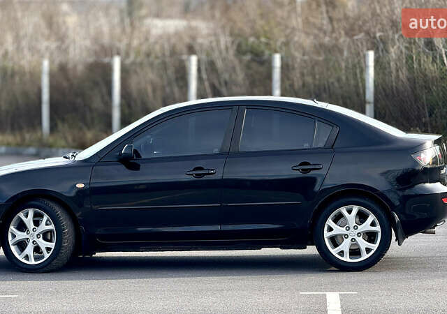 Чорний Мазда 3, об'ємом двигуна 1.6 л та пробігом 237 тис. км за 5850 $, фото 20 на Automoto.ua