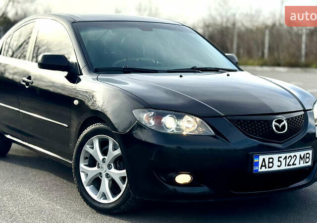 Чорний Мазда 3, об'ємом двигуна 1.6 л та пробігом 237 тис. км за 5850 $, фото 28 на Automoto.ua