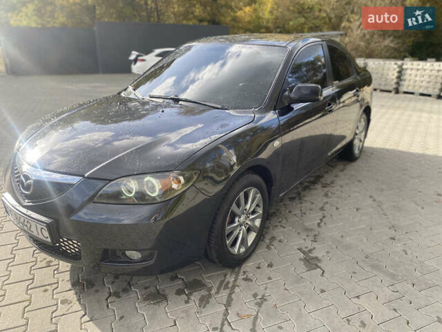 Чорний Мазда 3, об'ємом двигуна 1.6 л та пробігом 203 тис. км за 4350 $, фото 5 на Automoto.ua