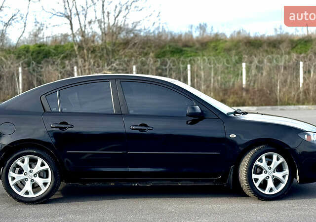 Чорний Мазда 3, об'ємом двигуна 1.6 л та пробігом 237 тис. км за 5850 $, фото 6 на Automoto.ua