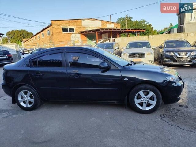 Чорний Мазда 3, об'ємом двигуна 1.6 л та пробігом 149 тис. км за 4800 $, фото 7 на Automoto.ua