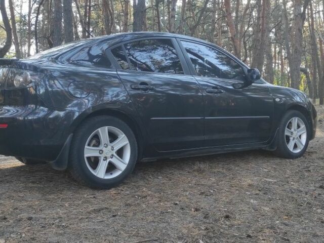 Чорний Мазда 3, об'ємом двигуна 1.6 л та пробігом 173 тис. км за 5300 $, фото 4 на Automoto.ua