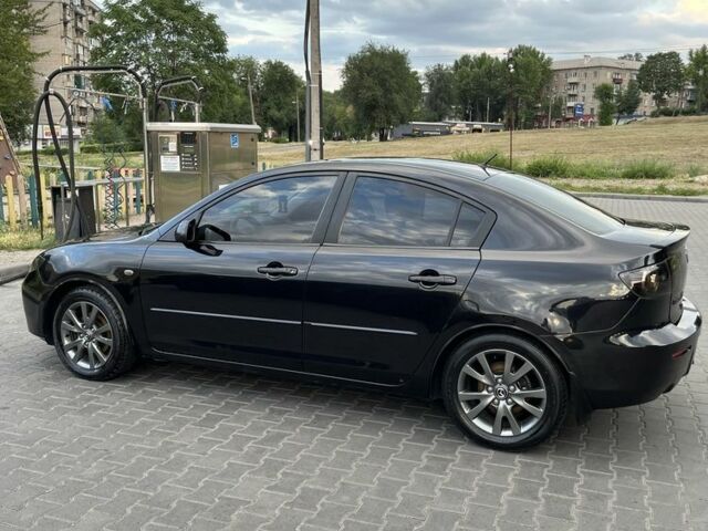 Черный Мазда 3, объемом двигателя 1.6 л и пробегом 299 тыс. км за 5200 $, фото 10 на Automoto.ua