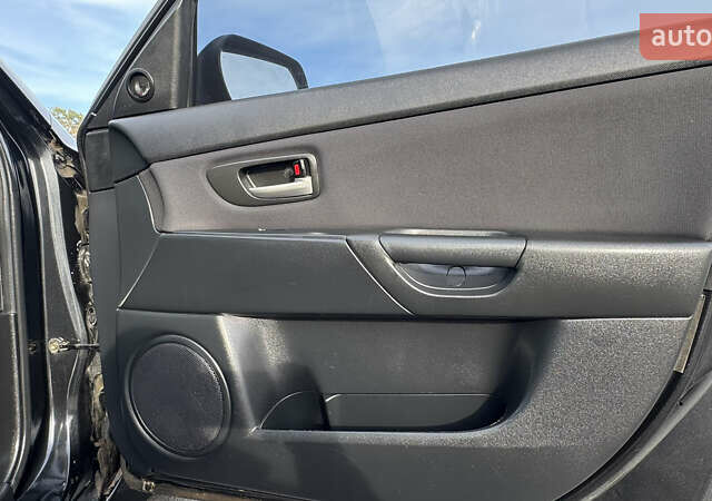 Чорний Мазда 3, об'ємом двигуна 1.6 л та пробігом 237 тис. км за 5850 $, фото 34 на Automoto.ua