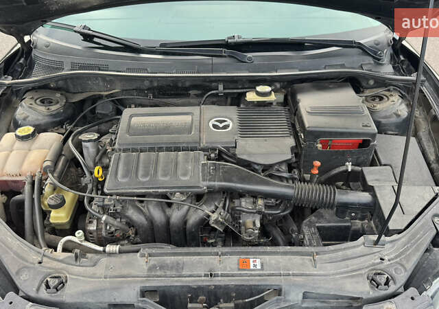Чорний Мазда 3, об'ємом двигуна 1.6 л та пробігом 237 тис. км за 5850 $, фото 57 на Automoto.ua