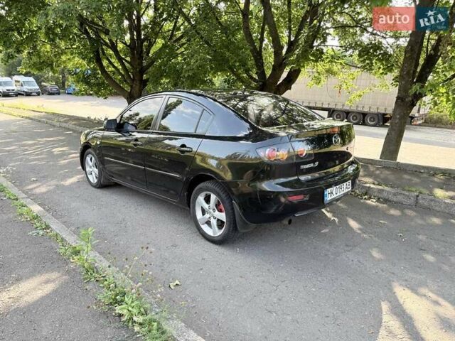 Черный Мазда 3, объемом двигателя 1.6 л и пробегом 285 тыс. км за 4599 $, фото 4 на Automoto.ua