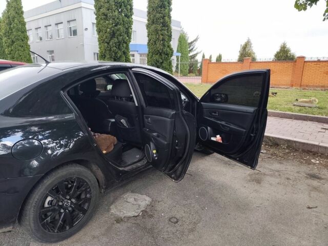 Черный Мазда 3, объемом двигателя 2 л и пробегом 225 тыс. км за 4194 $, фото 4 на Automoto.ua