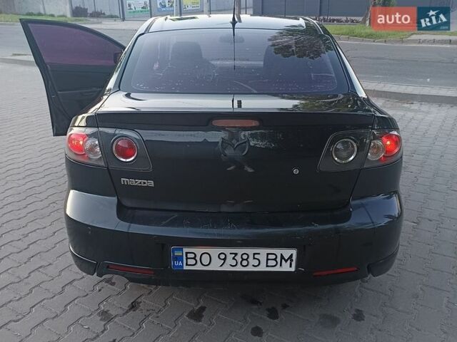 Черный Мазда 3, объемом двигателя 2 л и пробегом 225 тыс. км за 3450 $, фото 10 на Automoto.ua