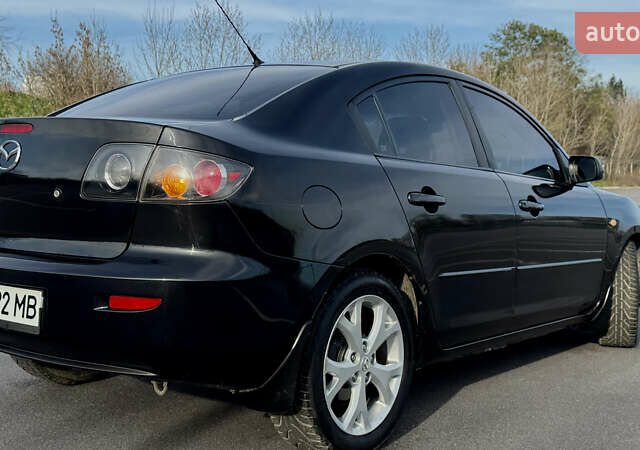 Чорний Мазда 3, об'ємом двигуна 1.6 л та пробігом 237 тис. км за 5850 $, фото 11 на Automoto.ua