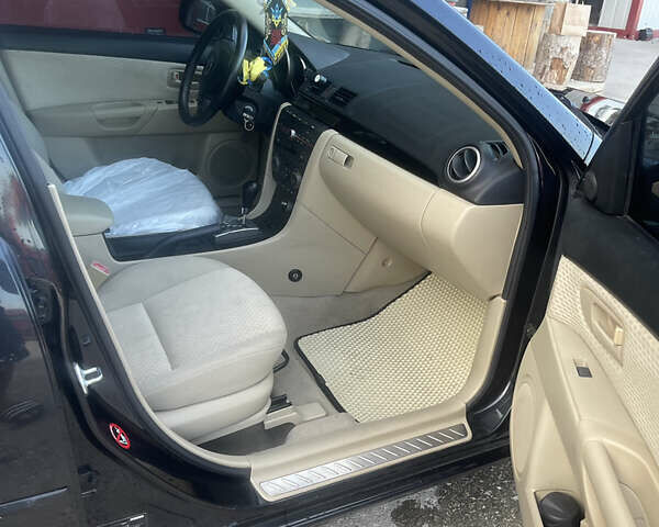 Черный Мазда 3, объемом двигателя 1.6 л и пробегом 175 тыс. км за 5200 $, фото 3 на Automoto.ua