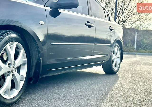 Чорний Мазда 3, об'ємом двигуна 1.6 л та пробігом 237 тис. км за 5850 $, фото 29 на Automoto.ua