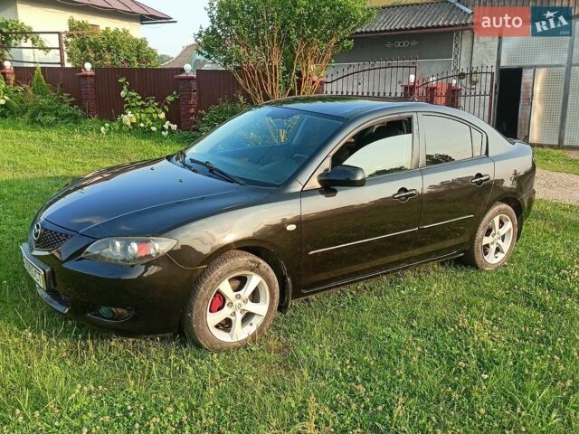 Чорний Мазда 3, об'ємом двигуна 1.6 л та пробігом 215 тис. км за 5300 $, фото 6 на Automoto.ua