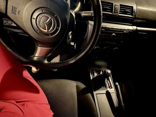 Чорний Мазда 3, об'ємом двигуна 2 л та пробігом 115 тис. км за 6350 $, фото 6 на Automoto.ua