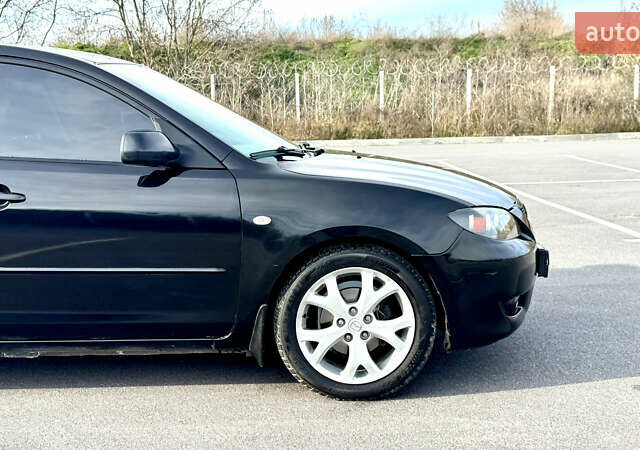 Чорний Мазда 3, об'ємом двигуна 1.6 л та пробігом 237 тис. км за 5850 $, фото 15 на Automoto.ua