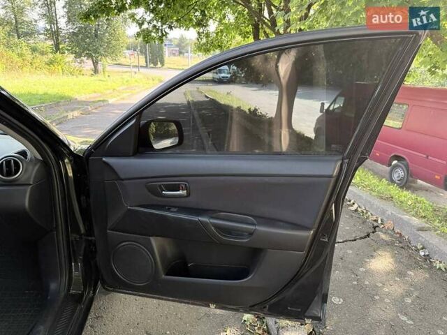 Черный Мазда 3, объемом двигателя 1.6 л и пробегом 285 тыс. км за 4599 $, фото 18 на Automoto.ua