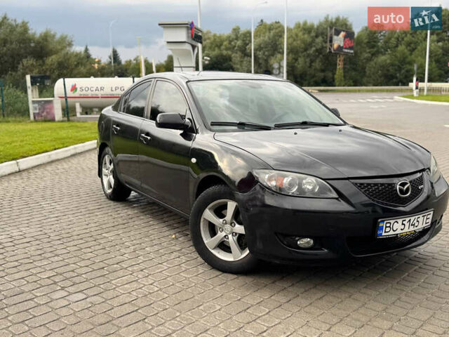 Чорний Мазда 3, об'ємом двигуна 1.6 л та пробігом 231 тис. км за 3650 $, фото 2 на Automoto.ua