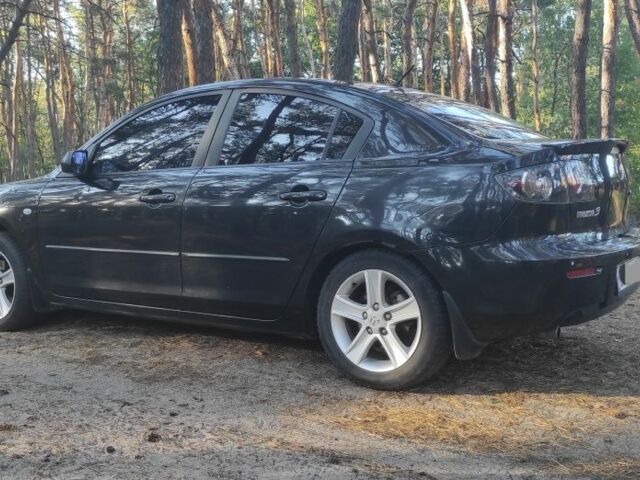 Чорний Мазда 3, об'ємом двигуна 1.6 л та пробігом 173 тис. км за 5300 $, фото 7 на Automoto.ua
