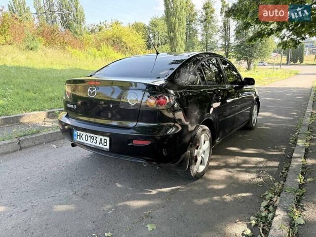 Черный Мазда 3, объемом двигателя 1.6 л и пробегом 285 тыс. км за 4599 $, фото 6 на Automoto.ua