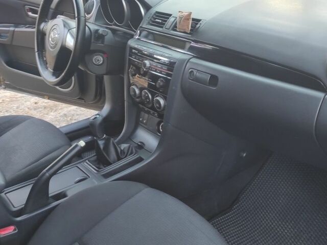 Чорний Мазда 3, об'ємом двигуна 1.6 л та пробігом 173 тис. км за 5300 $, фото 9 на Automoto.ua