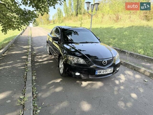 Черный Мазда 3, объемом двигателя 1.6 л и пробегом 285 тыс. км за 4599 $, фото 1 на Automoto.ua
