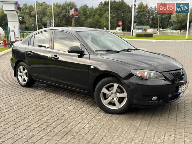 Чорний Мазда 3, об'ємом двигуна 1.6 л та пробігом 231 тис. км за 3650 $, фото 3 на Automoto.ua