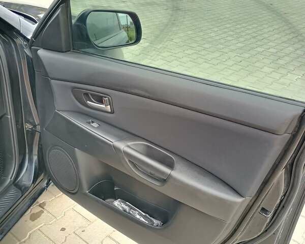 Чорний Мазда 3, об'ємом двигуна 1.6 л та пробігом 262 тис. км за 5100 $, фото 12 на Automoto.ua