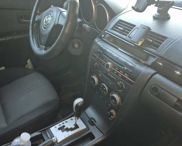 Чорний Мазда 3, об'ємом двигуна 1.6 л та пробігом 168 тис. км за 5600 $, фото 6 на Automoto.ua