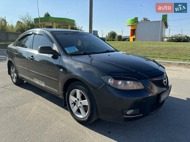 Черный Мазда 3, объемом двигателя 2 л и пробегом 150 тыс. км за 5999 $, фото 6 на Automoto.ua