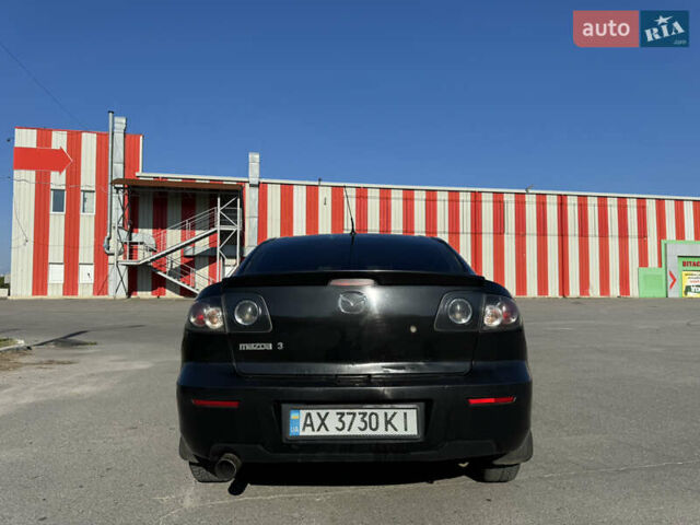 Черный Мазда 3, объемом двигателя 2 л и пробегом 150 тыс. км за 5999 $, фото 3 на Automoto.ua