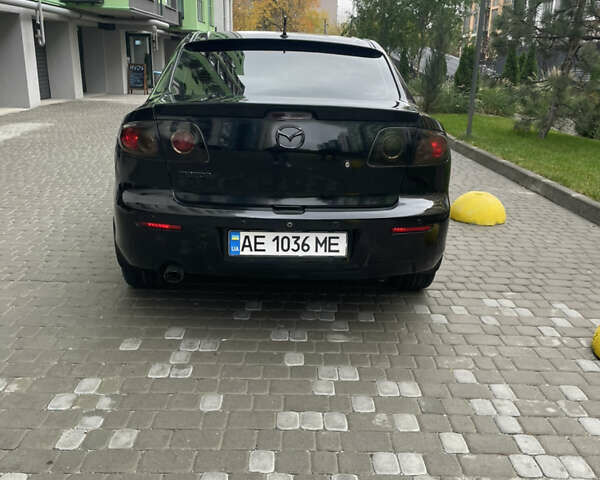 Черный Мазда 3, объемом двигателя 1.6 л и пробегом 206 тыс. км за 6000 $, фото 8 на Automoto.ua