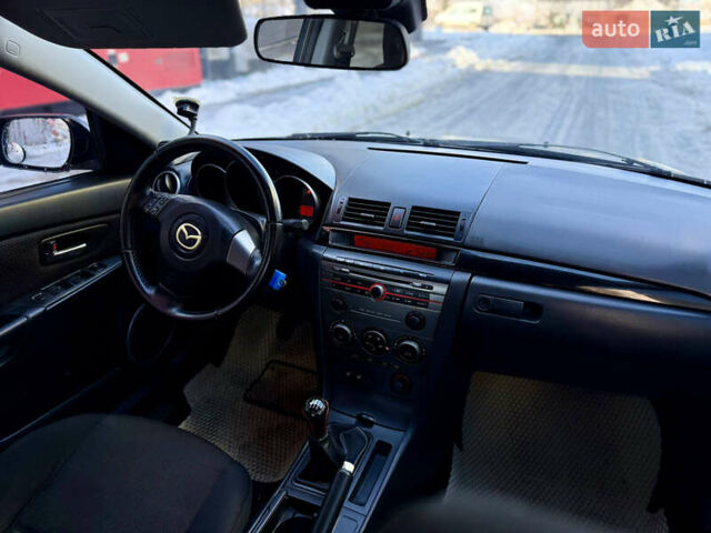 Черный Мазда 3, объемом двигателя 1.6 л и пробегом 210 тыс. км за 3950 $, фото 14 на Automoto.ua