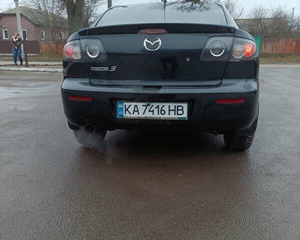 Черный Мазда 3, объемом двигателя 1.6 л и пробегом 232 тыс. км за 5850 $, фото 6 на Automoto.ua