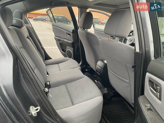 Чорний Мазда 3, об'ємом двигуна 1.6 л та пробігом 188 тис. км за 6800 $, фото 20 на Automoto.ua