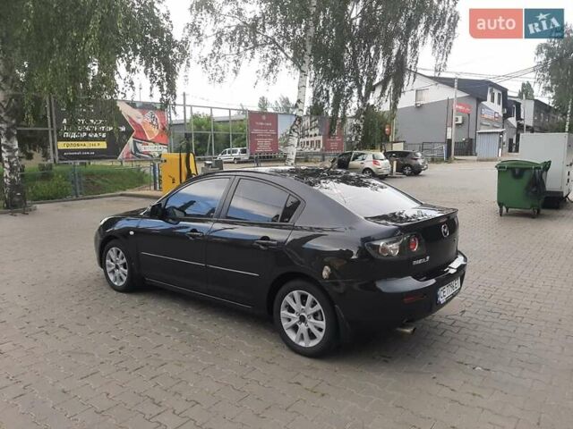 Черный Мазда 3, объемом двигателя 1.6 л и пробегом 183 тыс. км за 5800 $, фото 6 на Automoto.ua