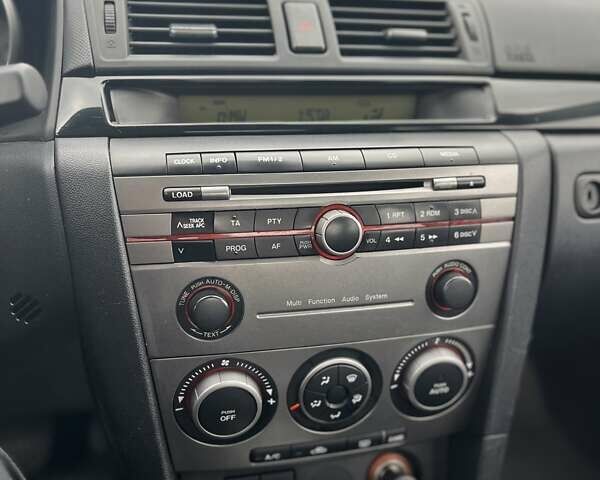 Черный Мазда 3, объемом двигателя 1.6 л и пробегом 180 тыс. км за 5700 $, фото 28 на Automoto.ua