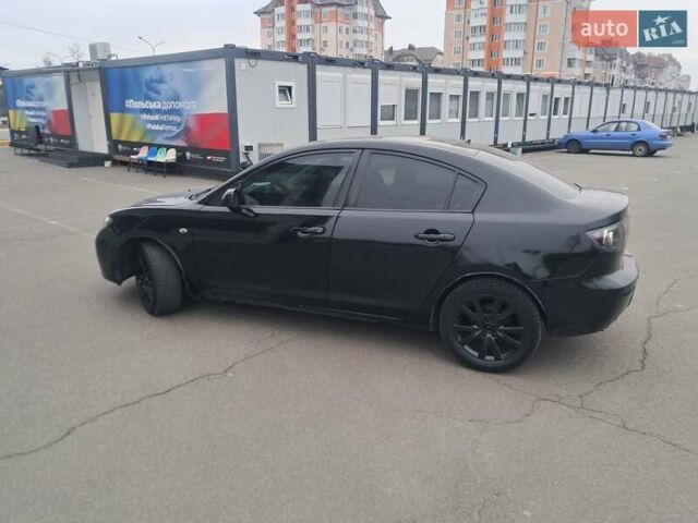 Черный Мазда 3, объемом двигателя 1.6 л и пробегом 305 тыс. км за 4000 $, фото 7 на Automoto.ua