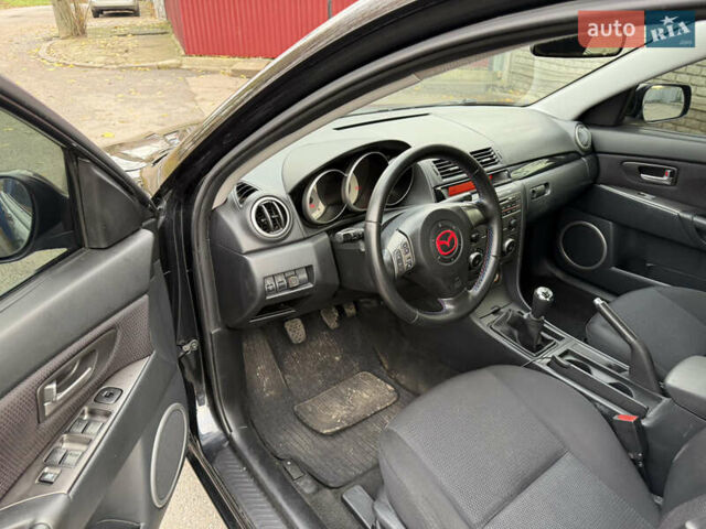 Черный Мазда 3, объемом двигателя 1.6 л и пробегом 189 тыс. км за 4300 $, фото 11 на Automoto.ua